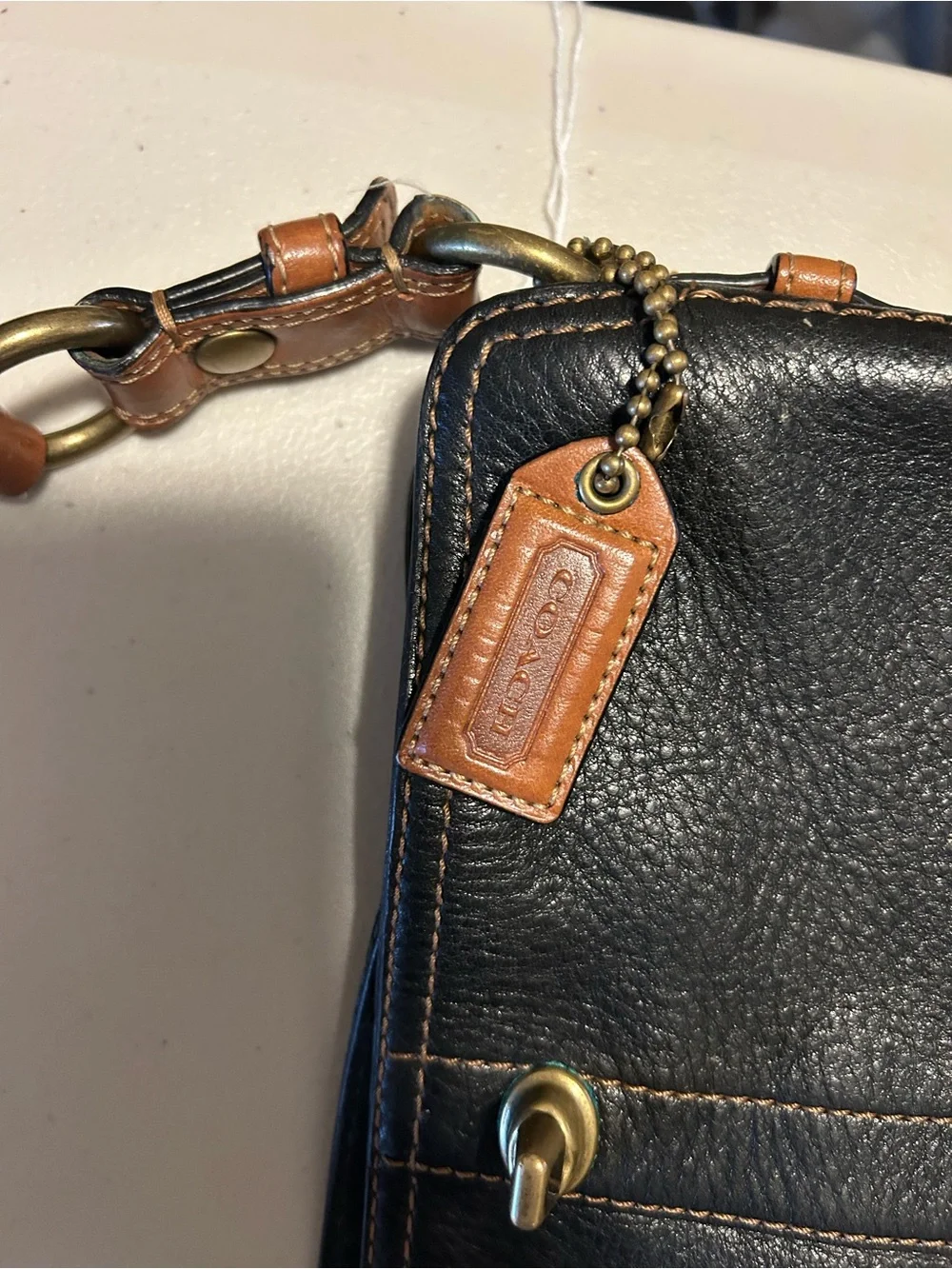 Coach sleek black